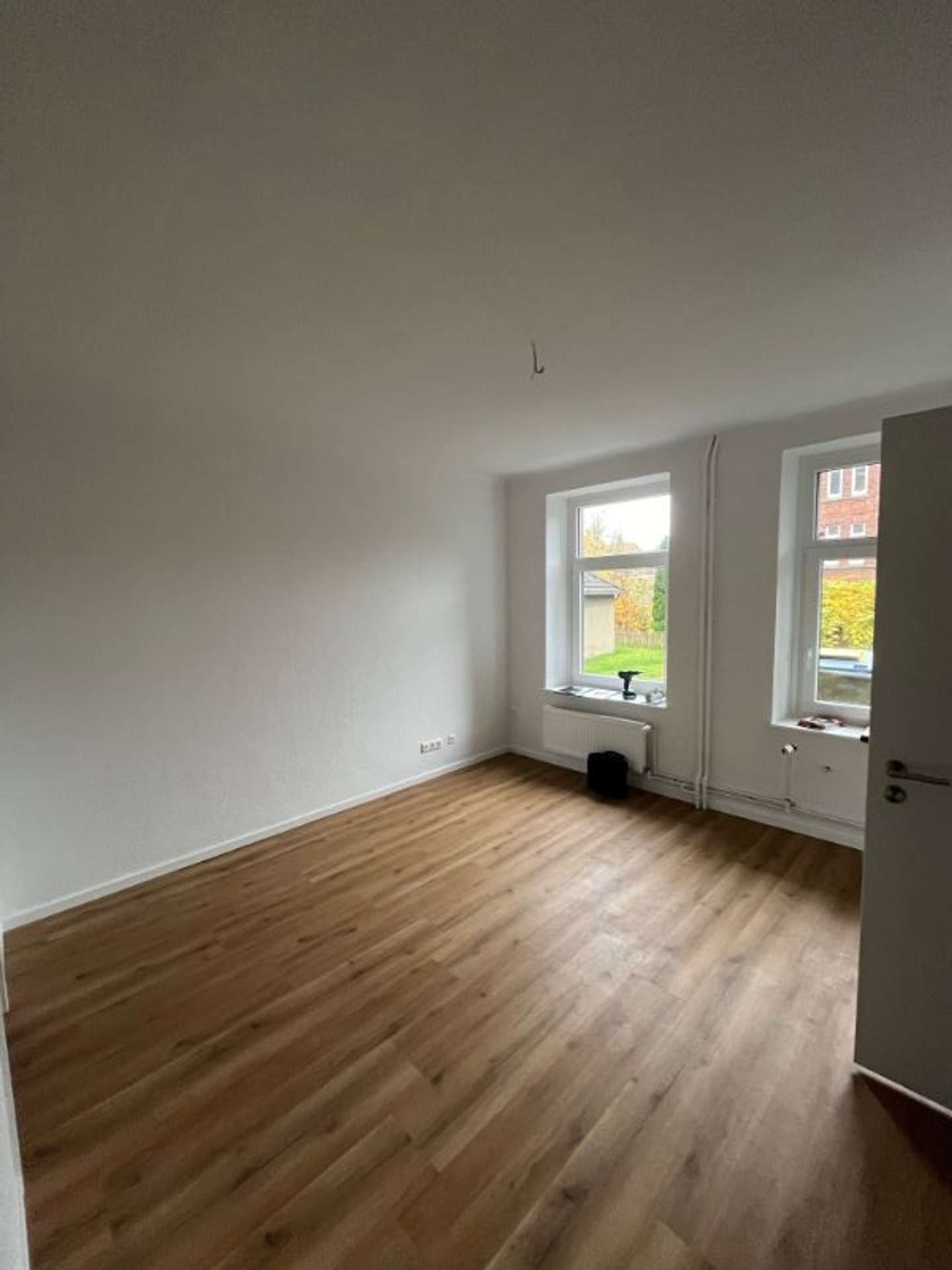 Erstbezug nach Sanierung – stilvolle Wohnung zu vermieten!, Wilhelmstraße 15b, 24534 Neumünster, Erdgeschosswohnung