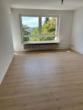 Wohnzimmer - Helle, sanierte 3-Zimmerwohnung mit Balkon zum 01.06.2025