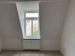Schlafzimmer - Renovierte 2-Zimmer-Wohnung mit Charme und sonnigem Balkon