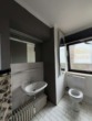Gäste-WC Wohnzimmerbereich - Traumhafte Maisonette mit XXL-Dachterrasse im Herzen von Neuss – Am Konvent 2