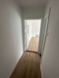Flur - Frisch renovierte 2-Zimmer-Wohnung mit moderner Einbauküche