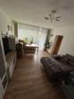 Wohnzimmer - Familienfreundliche 3-Zimmer Wohnung in Duisburg-Mündelheim