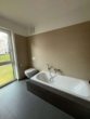 Badezimmer - Modern geschnittene 3-Zimmer-Wohnung mit Balkon