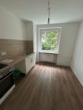 Küche - Modernisierte 3-Zimmer-Erdgeschosswohnung mit stilvollem Ambiente zum 01.09.2025 bezugsfertig!