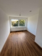 Wohnzimmer - Attraktive 3-Zimmer-Wohnung mit Wohlfühlcharakter zum 15.09.2026