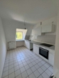 Küche - Charmante, geräumige 2‑Zimmer‑Dachgeschosswohnung – teilsaniert und bezugsfertig ab sofort