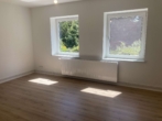 Wohnzimmer - Renovierte 3-Zimmerwohnung mit EBK!