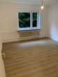 Wohnzimmer - Moderne 3‑Zimmer‑Erdgeschosswohnung in zentrumsnaher Lage – Nachmieter/in gesucht ab dem 16.06.2026!