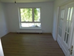 Wohnzimmer - Großzügige 4 Zimmerwohnung in Mürwik zum 16.11.2025 vermietbar!
