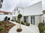 Hausansicht - Erstbezug – Moderne, funktionale 1-Zi-LOFT-Wohnung im EG mit kleinem Gartenanteil