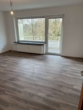 Wohnzimmer - Helle 2-Zimmer-Wohnung mit Balkon und Grünblick – ab 01.08.2026 verfügbar!