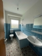 Badezimmer - Familienfreundliche 3-Zimmerwohnung mit Loggia in Duisburg Mündelheim