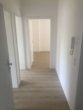 Flur - Wir sanieren für Sie eine 2-Zimmerwohnung mit Balkon!