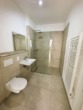 Badezimmer - Erstbezug – Modernes, funktionales 1-Zi-Apartment im EG
