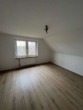 Wohnzimmer - 2-Zimmer-Dachgeschosswohnung „Offene Besichtigung am 14.07.2025 um 13.30 Uhr“