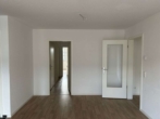 Wohnzimmer - Moderne 3-Zimmer-Wohnung im 4. OG mit Balkon