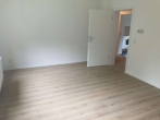 Wohnzimmer - Schicke, sanierte 3-Zimmerwohnung in Altengroden!