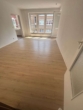 Wohnzimmer - Mitten im Zentrum: 2-Zimmer-Wohnung ab dem 01.08.2026 verfügbar
