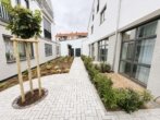 Hausansicht - Erstbezug – Moderne, funktionale 1-Zi-LOFT-Wohnung im EG mit kleinem Gartenanteil