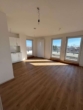 Wohnzimmer - lichtdurchflutete 3 Zimmer Dachgeschoßwohnung mit Terrasse