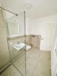 Badezimmer - Erstbezug – Modernes, funktionales 1-Zi-Apartment im EG