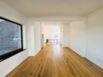 Wohnzimmer - Blick über die Dächer Offenbachs – Penthouse-Wohnung mit großzügiger Dachterrasse