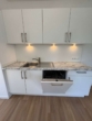 Foto Einbauküche - Wohnen in grüner Oase – Moderne 3-Zimmer-Wohnung mit Terrasse und kleinem Garten