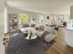 Beispiel Wohnzimmer - Wohnen in grüner Oase – Moderne 3-Zimmer-Wohnung mit Terrasse und kleinem Garten