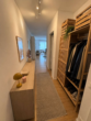 Flur - Modern geschnittene 3-Zimmer-Wohnung mit Balkon und Einbauküchen-Option