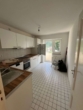 Küche mit Zugang Balkon - Nachmieter gesucht: 2-Zimmer-Wohnung mit Balkon und Gartennutzung ab 01.09.2026
